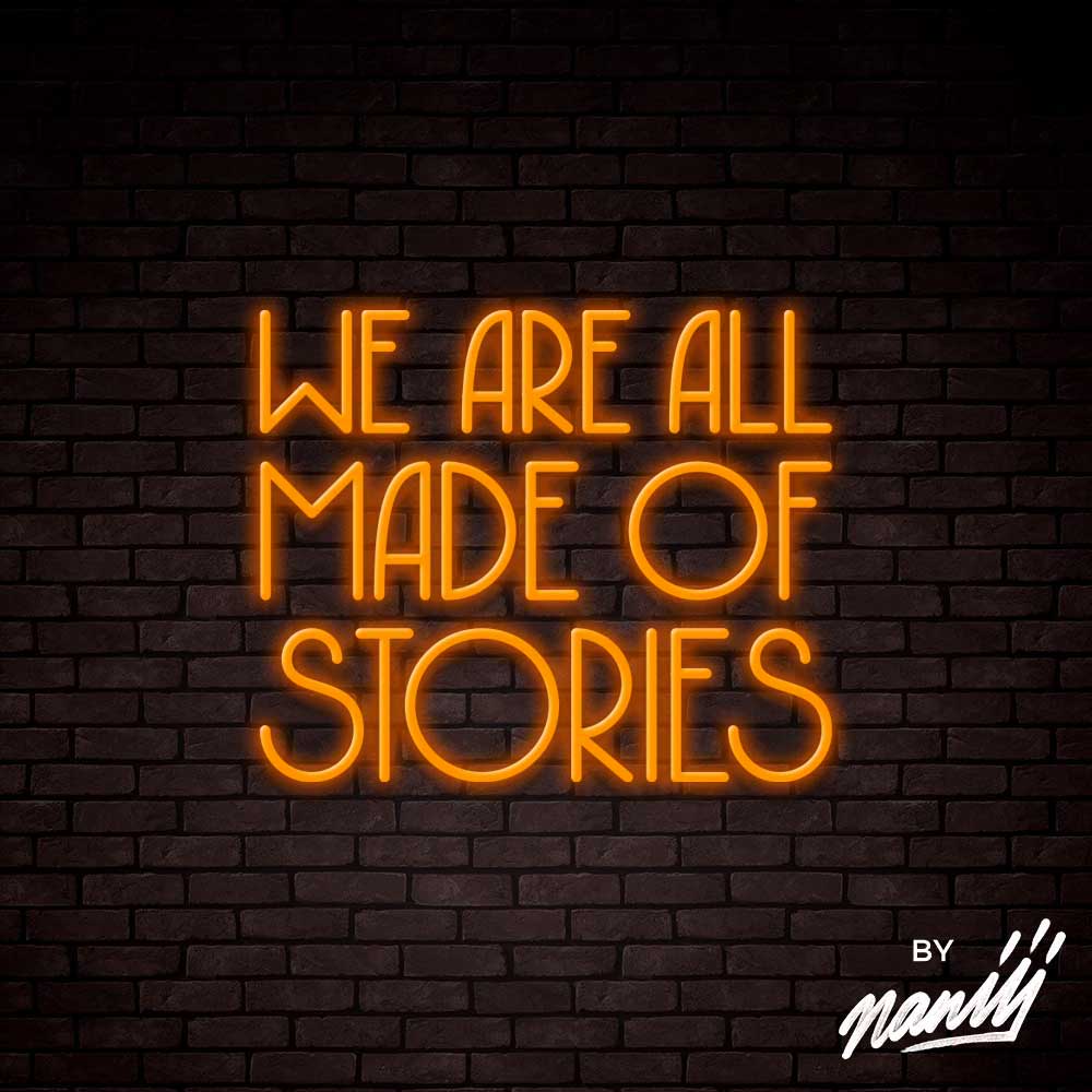 neon deco we are all made of stories orange